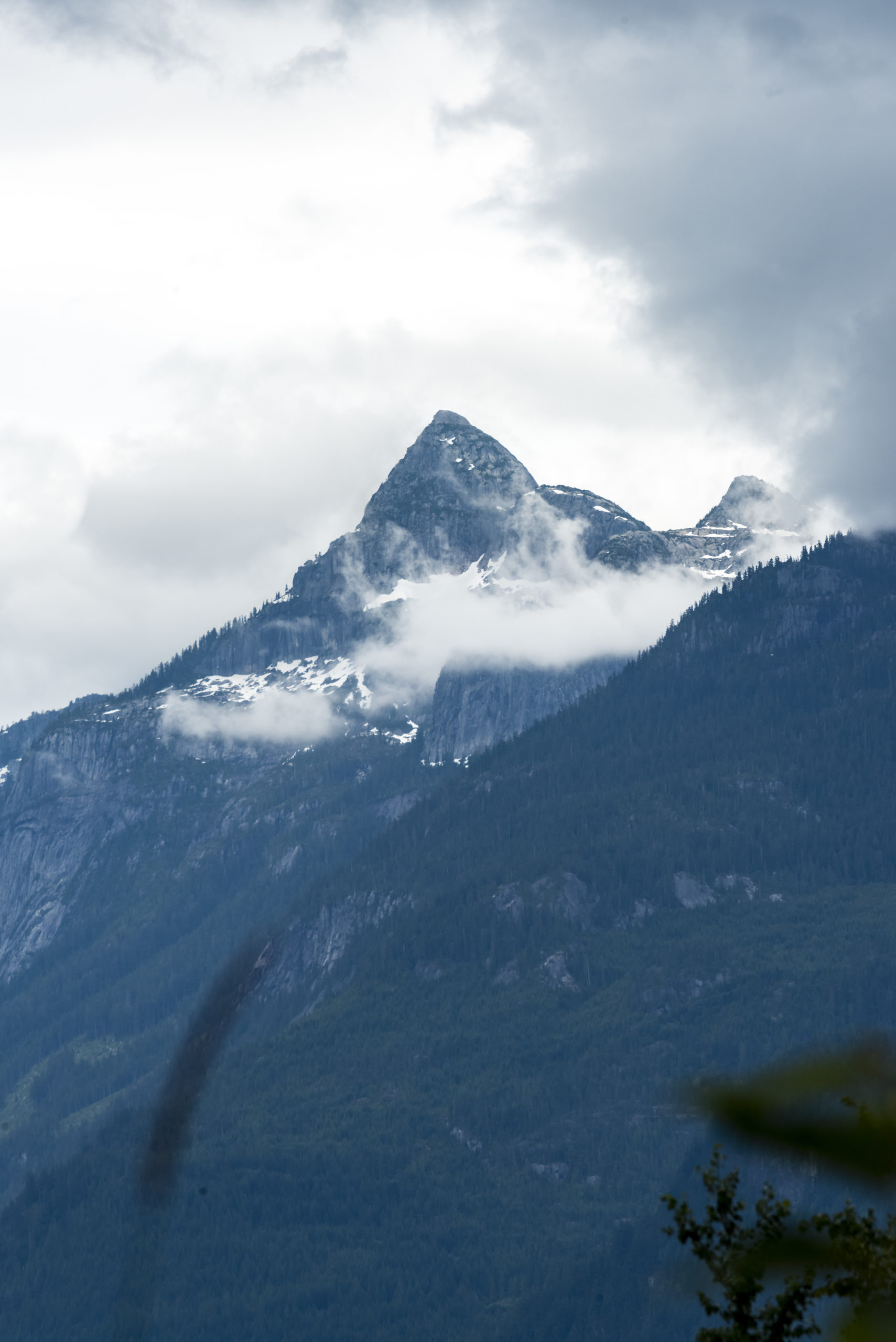 Mountain in the clouds during early summer